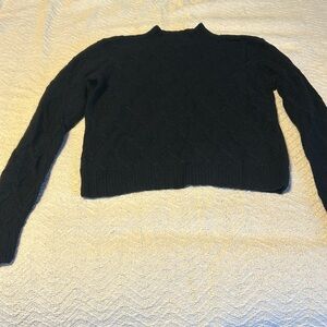 Magaschoni Small Mock Turtleneck Black Cashmere Sweater with Chainlink Design.
